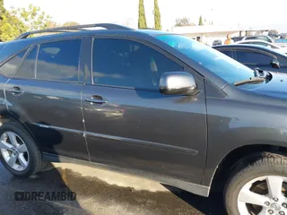 2007 Lexus RX 400h z VIN JTJGW31U772004557, wystawiony jako IAAI lot #41458659 z przebiegiem 193 678 mil mil oraz . Historia ofert i sprzedaży dostępna na DreamBid. Obrazek 13.