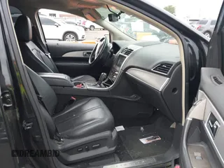 2011 Lincoln MKX with VIN 2LMDJ8JK1BBJ21327, listed as a IAAI auction lot 39778150 with 191,013 mi miles. Bid and sale history available at carsss.com. Image 5.