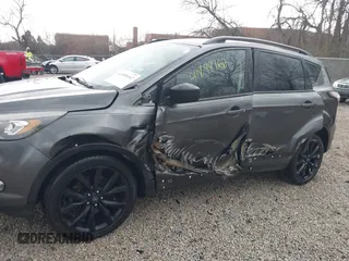 2017 Ford Escape SE with VIN 1FMCU0G97HUE53859, listed as a IAAI auction lot 41898162 with 79,619 mi miles. Bid and sale history available at carsss.com. Image 6.