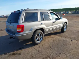 2001 Jeep Grand Cherokee Limited with VIN 1J4GW58N61C670589, listed as a IAAI auction lot 41817712 with 185,905 mi miles. Bid and sale history available at carsss.com. Image 4.