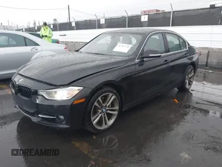2013 BMW 3 Series ActiveHybrid 3 with VIN WBA3F9C57DF483994, listed as a IAAI auction lot 41797778 with 92,313 mi miles. Bid and sale history available at carsss.com. Image 2.