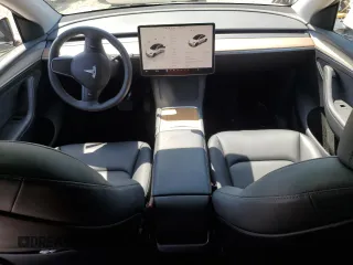 2023 Tesla Model Y Long Range z VIN 7SAYGDEE2PA061792, wystawiony jako Copart lot #52106965 z przebiegiem 11 968 mil mil oraz Szkoda całkowita • Salvage title. Historia ofert i sprzedaży dostępna na DreamBid. Obrazek 8.