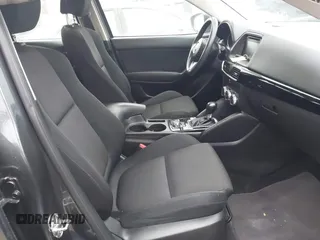 2016 Mazda CX-5 Sport with VIN JM3KE4BY5G0885754, listed as a IAAI auction lot 41103575 with 136,263 mi miles and . Bid and sale history available at carsss.com. Image 5.