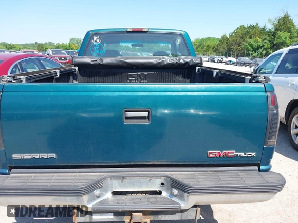 1996 GMC Sierra 1500 z VIN 1GTEK19R6TE514322, wystawiony jako IAAI lot #42253821 z przebiegiem 190 491 mil mil oraz . Historia ofert i sprzedaży dostępna na DreamBid. Obrazek 16.