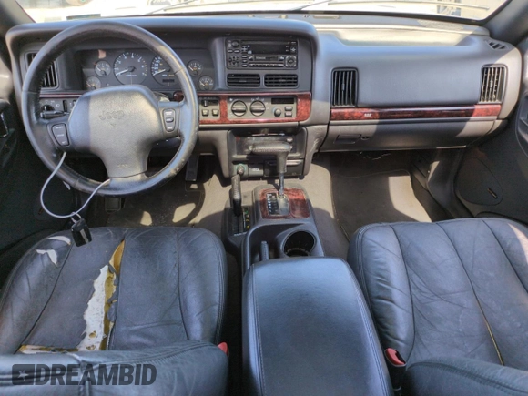 1998 Jeep Grand Cherokee Limited z VIN 1J4GZ88Z8WC306919, wystawiony jako Copart lot #61505725 z przebiegiem 195 329 mil mil oraz Czysty tytuł • Clean title. Historia ofert i sprzedaży dostępna na DreamBid. Obrazek 8.