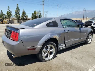 2007 Ford Mustang Deluxe with VIN 1ZVFT80N775319949, listed as a Copart auction lot 57623665 with 128,972 mi miles and Salvage title. Bid and sale history available at DreamBid. Image 3.