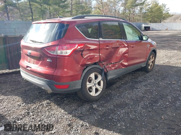 2016 Ford Escape SE with VIN 1FMCU9GX7GUC85187, listed as a IAAI auction lot 41678991 with 123,812 mi miles and . Bid and sale history available at DreamBid. Image 4.