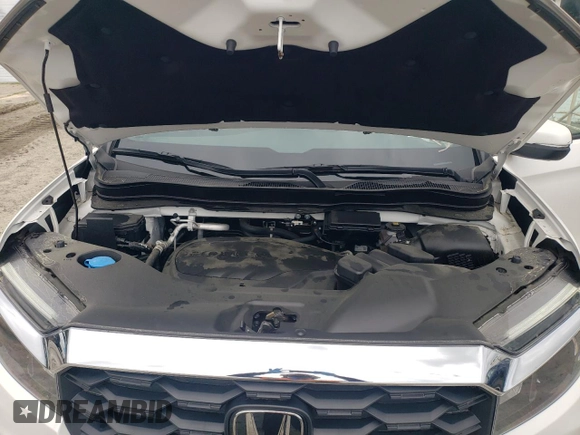 2024 Honda Passport EX-L z VIN 5FNYF8H50RB023552, wystawiony jako Copart lot #58101325 z przebiegiem 573 mil mil oraz Tytuł czysty. Historia ofert i sprzedaży dostępna na DreamBid. Obrazek 12.