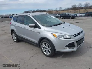 2014 Ford Escape Titanium with VIN 1FMCU9J92EUD59994, listed as a IAAI auction lot 41859021 with 122,748 mi miles. Bid and sale history available at carsss.com. Image 1.