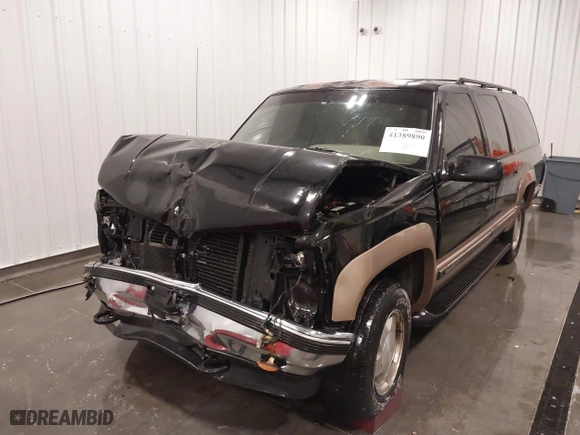 1996 GMC Suburban with VIN 1GKFK16R5TJ721935, listed as a IAAI auction lot 41389890 with 189,243 mi miles. Bid and sale history available at carsss.com. Image 6.