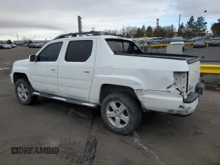 2010 Honda Ridgeline RTL with VIN 5FPYK1F58AB005088, listed as a Copart auction lot 47477975 with 128,538 mi miles and Salvage Title. Bid and sale history available at carsss.com. Image 2.