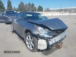 2005 Nissan 350Z Touring with VIN JN1AZ36A35M756159, listed as a IAAI auction lot 41783067 with 143,573 mi miles. Bid and sale history available at carsss.com. Image 1.