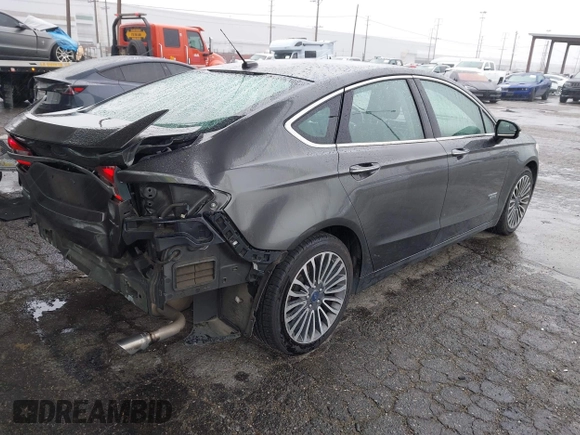 2017 Ford Fusion Titanium with VIN 3FA6P0SU8HR329570, listed as a IAAI auction lot 41773023 with 112,022 mi miles and . Bid and sale history available at DreamBid. Image 4.