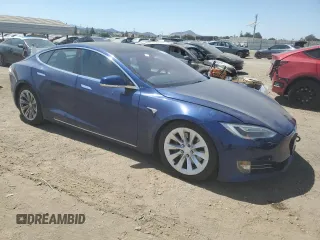 2017 Tesla Model S 100D с VIN 5YJSA1E28HF213023, выставлен на аукционе Copart как лот 50136795 с пробегом Не указан миль и Списание • Salvage title. История ставок и продаж доступна на DreamBid. Изображение 4.