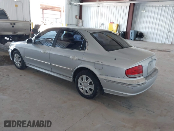 2002 Hyundai Sonata GLS with VIN KMHWF35H32A643718, listed as a IAAI auction lot 41668672 with 174,782 mi miles. Bid and sale history available at carsss.com. Image 3.