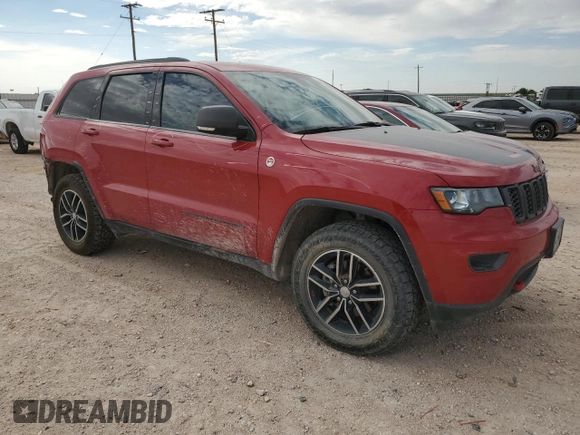 2018 Jeep Grand Cherokee Trailhawk with VIN 1C4RJFLGXJC477597, listed as a Copart auction lot 56338075 with 91,443 mi miles and Salvage title. Bid and sale history available at DreamBid. Image 4.
