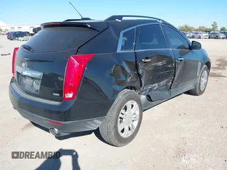2015 Cadillac SRX with VIN 3GYFNAE30FS573125, listed as a IAAI auction lot 40972187 with 122,612 mi miles and . Bid and sale history available at DreamBid. Image 4.