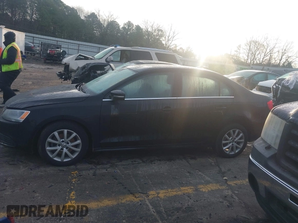 2014 Volkswagen Jetta Sedan SE with VIN 3VWD17AJ1EM322226, listed as a IAAI auction lot 41211984 with 217,084 mi miles. Bid and sale history available at carsss.com. Image 14.