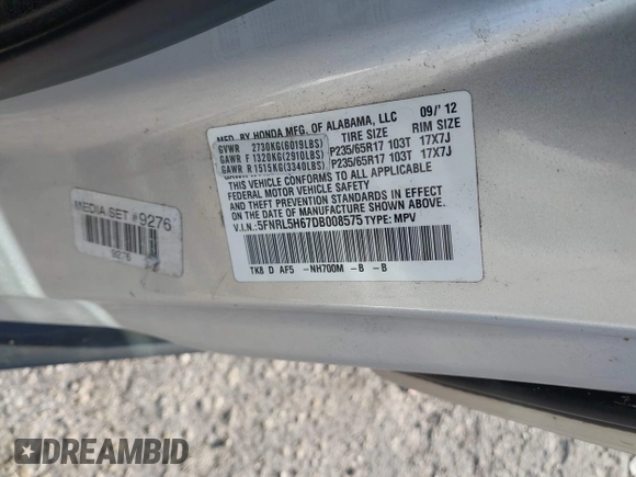 2013 Honda Odyssey EX-L with VIN 5FNRL5H67DB008575, listed as a IAAI auction lot 42008315 with 131,984 mi miles and . Bid and sale history available at carsss.com. Image 9.