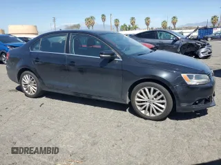 2012 Volkswagen Jetta SEL with VIN 3VWLP7AJ0CM327814, listed as a Copart auction lot 52235685 with 97,705 mi miles and Salvage title. Bid and sale history available at DreamBid. Image 4.