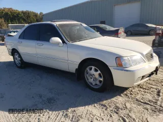 2000 Acura RL with VIN JH4KA9657YC004956, listed as a Copart auction lot 77944634 with 0 mi miles and Salvage Title. Bid and sale history available at carsss.com. Image 4.