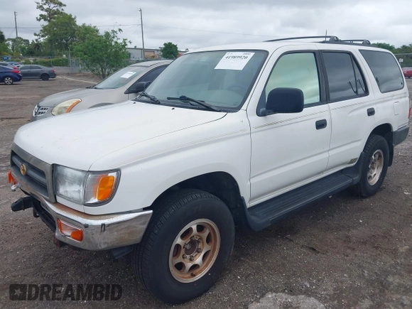 1998 Toyota 4Runner with VIN JT3GM84R5W0031171, listed as a IAAI auction lot 41989920 with 163,296 mi miles and . Bid and sale history available at DreamBid. Image 2.