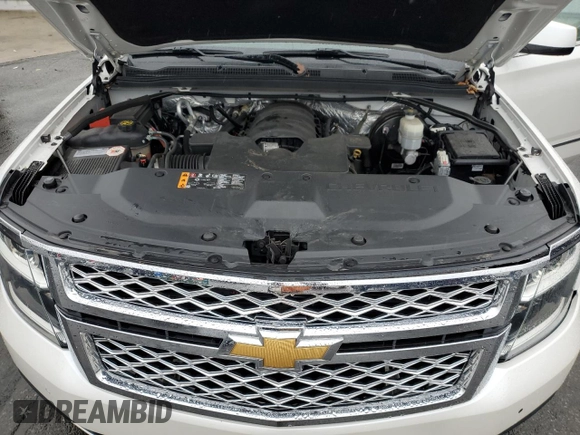 2017 Chevrolet Tahoe LT z VIN 1GNSKBKC5HR306034, wystawiony jako Copart lot #55788245 z przebiegiem 87 726 mil mil oraz Szkoda całkowita • Salvage title. Historia ofert i sprzedaży dostępna na DreamBid. Obrazek 12.