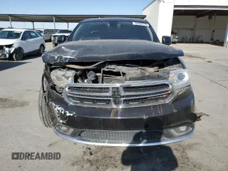 2015 Dodge Durango SXT with VIN 1C4RDHAG2FC931046, listed as a Copart auction lot 52409775 with 164,509 mi miles and Salvage title. Bid and sale history available at DreamBid. Image 5.