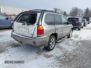 2007 GMC Envoy SLE with VIN 1GKDT13S072246688, listed as a IAAI auction lot 41258265 with 218,001 mi miles. Bid and sale history available at carsss.com. Image 4.