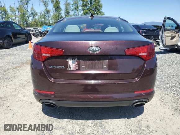 2012 Kia Optima LX with VIN 5XXGM4A79CG058892, listed as a Copart auction lot 55579085 with 153,323 mi miles and Clean Title. Bid and sale history available at carsss.com. Image 6.