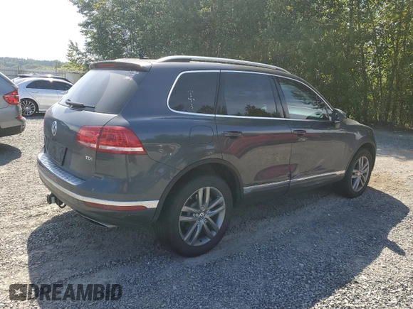 2015 Volkswagen Touareg Lux с VIN WVGEP9BP0FD006992, выставлен на аукционе Copart как лот 59524445 с пробегом 169 822 миль миль и Списание • Salvage title. История ставок и продаж доступна на DreamBid. Изображение 3.