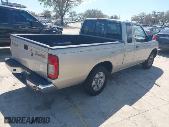 1999 Nissan Frontier XE z VIN 1N6DD26S4XC337030, wystawiony jako IAAI lot #41683250 z przebiegiem 143 765 mil mil oraz . Historia ofert i sprzedaży dostępna na DreamBid. Obrazek 4.