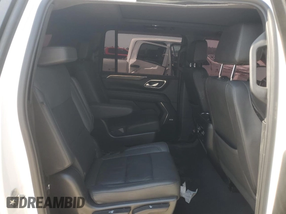 2023 Chevrolet Suburban with VIN 1GNSKDKL5PR286474, listed as a Copart auction lot 55678915 with 96,049 mi miles and Salvage title. Bid and sale history available at DreamBid. Image 11.