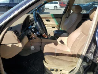 1996 BMW 7 Series 740iL z VIN WBAGJ8328TDL35931, wystawiony jako Copart lot #52402765 z przebiegiem Nie podano mil oraz Czysty tytuł • Clean title. Historia ofert i sprzedaży dostępna na DreamBid. Obrazek 7.