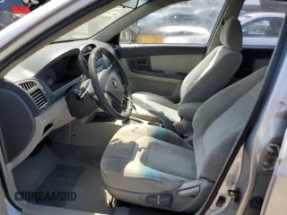 2005 Kia Spectra LX with VIN KNAFE122855179475, listed as a Copart auction lot 66996474 with 187,674 mi miles and Salvage Title. Bid and sale history available at carsss.com. Image 7.