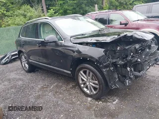 2016 Volkswagen Touareg Sport with VIN WVGEF9BP1GD012109, listed as a IAAI auction lot 42516380 with 117,918 mi miles and . Bid and sale history available at DreamBid. Image 1.