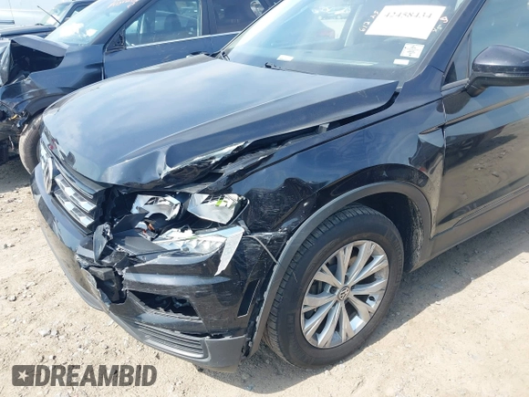2020 Volkswagen Tiguan S with VIN 3VV1B7AX1LM086019, listed as a IAAI auction lot 42458434 with 114,413 mi miles and . Bid and sale history available at DreamBid. Image 6.