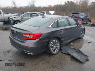 2020 Honda Accord with VIN 1HGCV3F17LA015904, listed as a IAAI auction lot 41393028 with 53,889 mi miles and . Bid and sale history available at DreamBid. Image 4.