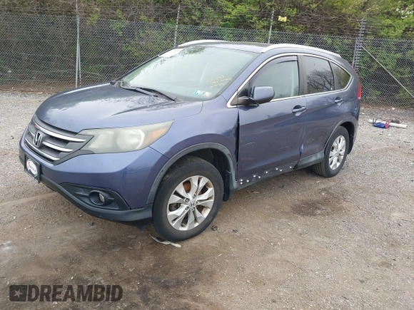 2014 Honda CR-V EX-L with VIN 5J6RM4H71EL092983, listed as a IAAI auction lot 42018356 with 136,024 mi miles. Bid and sale history available at carsss.com. Image 2.