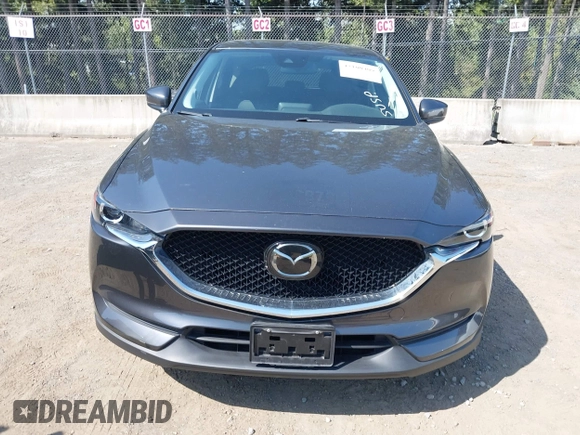 2020 Mazda CX-5 Touring with VIN JM3KFBCM6L1828691, listed as a IAAI auction lot 42100409 with 25,182 mi miles. Bid and sale history available at carsss.com. Image 12.