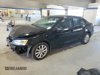 2012 Volkswagen Jetta Sedan SE w/Convenience PZEV with VIN 3VWDP7AJ1CM369896, listed as a Copart auction lot 50728385 with 128,147 mi miles and Salvage Title. Bid and sale history available at carsss.com. Image 1.