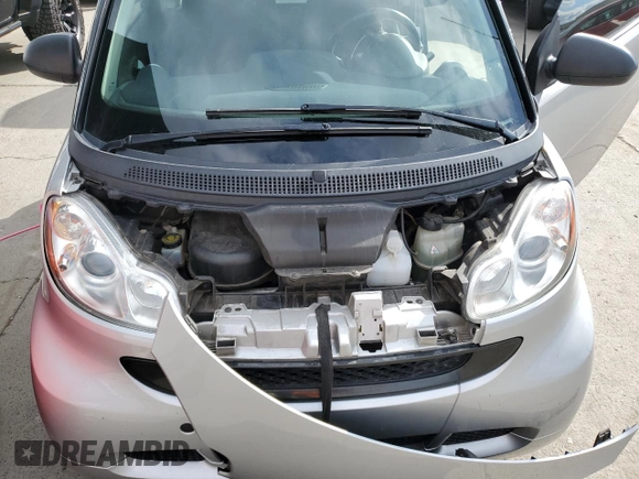 2012 Smart fortwo Pure z VIN WMEEJ3BA2CK549445, wystawiony jako Copart lot #48352495 z przebiegiem 53 406 mil mil oraz Tytuł czysty. Historia ofert i sprzedaży dostępna na DreamBid. Obrazek 11.