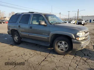 2002 Chevrolet Tahoe LS with VIN 1GNEC13T92R123293, listed as a Copart auction lot 46372295 with 251,320 mi miles and Salvage title. Bid and sale history available at DreamBid. Image 4.