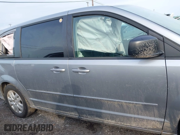 2015 Dodge Grand Caravan SE with VIN 2C4RDGBG8FR612296, listed as a IAAI auction lot 42112920 with 137,023 mi miles and . Bid and sale history available at DreamBid. Image 13.
