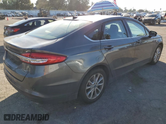 2017 Ford Fusion SE с VIN 3FA6P0H70HR268927, выставлен на аукционе Copart как лот 82872364 с пробегом 60 286 миль миль и Списание • Salvage title. История ставок и продаж доступна на DreamBid. Изображение 3.