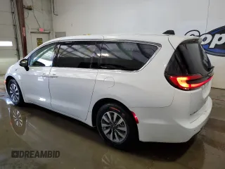 2023 Chrysler Pacifica Hybrid Touring L with VIN 2C4RC1L75PR611607, listed as a Copart auction lot 61475985 with 63,241 mi miles and Clean title. Bid and sale history available at DreamBid. Image 2.