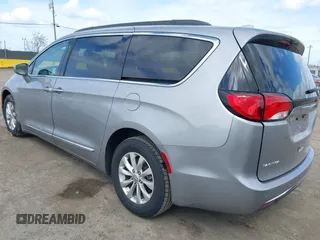2017 Chrysler Pacifica Touring L with VIN 2C4RC1BG1HR803027, listed as a IAAI auction lot 41896775 with 112,896 mi miles and . Bid and sale history available at DreamBid. Image 3.