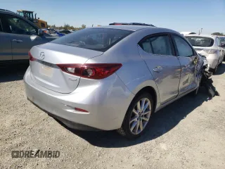 2017 Mazda 3 Touring z VIN 3MZBN1V79HM119726, wystawiony jako Copart lot #60819782 z przebiegiem 108 939 mil mil oraz Szkoda całkowita • Salvage title. Historia ofert i sprzedaży dostępna na DreamBid. Obrazek 4.