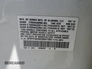 2014 Honda Pilot Touring z VIN 5FNYF4H9XEB047993, wystawiony jako Copart lot #57518705 z przebiegiem 159 809 mil mil oraz Szkoda całkowita • Salvage title. Historia ofert i sprzedaży dostępna na DreamBid. Obrazek 13.