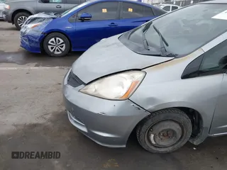 2009 Honda Fit with VIN JHMGE88279S055565, listed as a IAAI auction lot 41896359 with 184,618 mi miles. Bid and sale history available at carsss.com. Image 6.